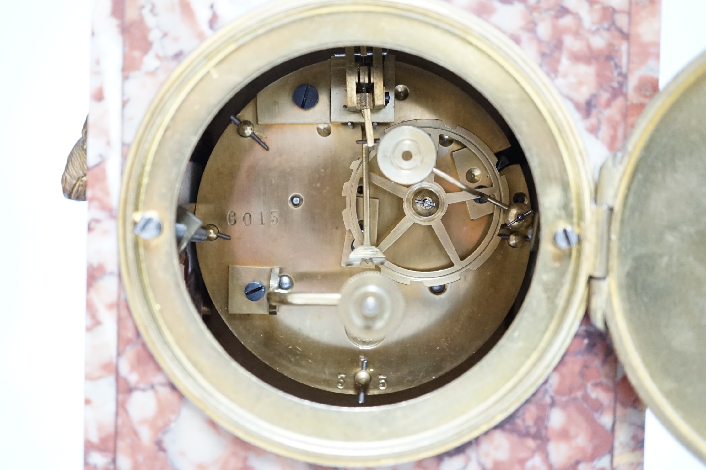 A mid-19th century rouge marble mantel clock, L. Marti et Cie Medaille D’argent two train movement, striking on a bell (bell missing), 29.5cm